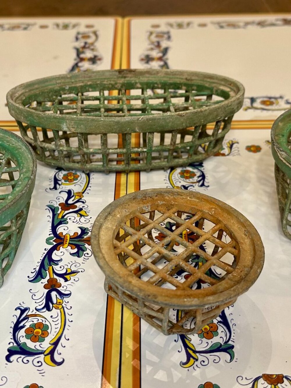 set of 4 vintage green-painted metal cage flower frogs by Dazey Manufacturing Co